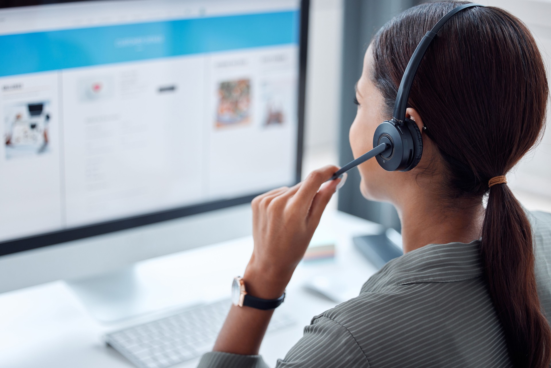 Shot of a businesswoman working in a call centre